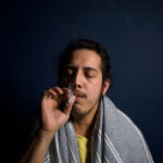 man-smoking-a-cigarette-395087