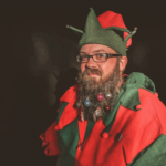 man-in-red-and-green-elf-costume-743917